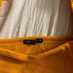 Zara orange cowgirl top.
